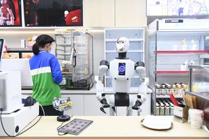 CHINA-BEIJING-TIENDA DE CONVENIENCIA-ROBOT
