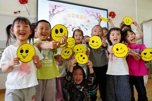 CHINA-DIA MUNDIAL DE LA SONRISA-EVENTOS