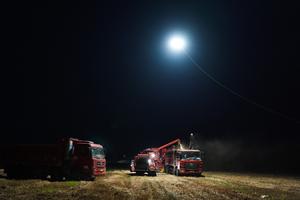 CHINA-ANHUI-COSECHA DE TRIGO-ILUMINACION CON DRONES