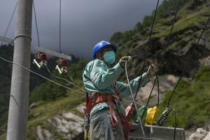 CHINA-XIZANG-GYIRONG-AVALANCHA DE LODO-RESTAURACION DE ENERGIA