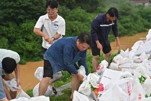 CHINA-GUANGXI-GUIGANG-LLUVIAS TORRENCIALES-AYUDA EN CASO DE DESASTRE