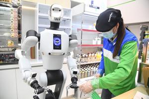 CHINA-BEIJING-TIENDA DE CONVENIENCIA-ROBOT