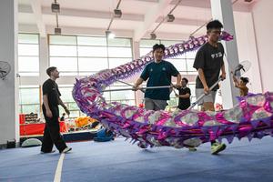 CHINA-WUHAN-BRASIL-DANZA DEL DRAGON-ENTRENADOR BRASILEÑO