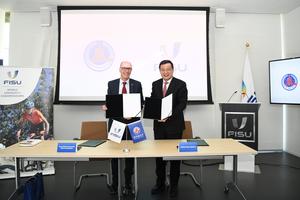 SUIZA-LAUSANA-XINHUA-FISU-MEMORANDUM DE ENTENDIMIENTO SOBRE COOPERACION NOTICIOSA
