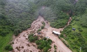 CHINA-GANSU-WEIYUAN-INUNDACION REPENTINA-TRABAJO DE RESCATE Y SOCORRO