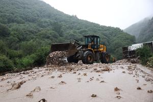 CHINA-GANSU-WEIYUAN-INUNDACION REPENTINA-TRABAJO DE RESCATE Y SOCORRO