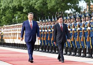 CHINA-BEIJING-XI JINPING-LAOS-THONGLOUN-CONVERSACIONES