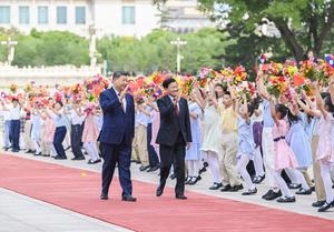 CHINA-BEIJING-XI JINPING-LAOS-THONGLOUN-CONVERSACIONES