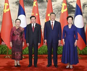 CHINA-BEIJING-XI JINPING-LAOS-THONGLOUN-CONVERSACIONES