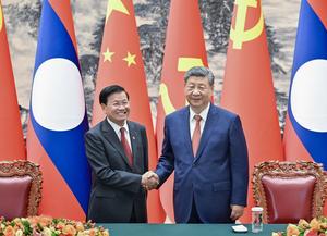 CHINA-BEIJING-XI JINPING-LAOS-THONGLOUN-CONVERSACIONES