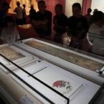CHINA-HAINAN-LITCHI-CULTURA-EXPOSICION