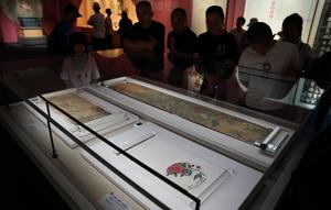 CHINA-HAINAN-LITCHI-CULTURA-EXPOSICION