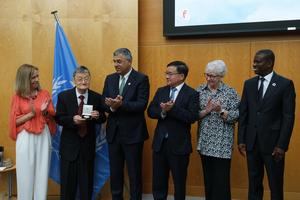 SUIZA-GINEBRA-CHINA-XU JIANMIN-PREMIO DE LA OMI