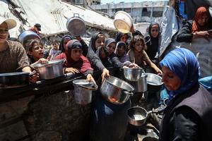 MEDIO ORIENTE-GAZA-CAMPAMENTO DE REFUGIADOS DE JABALIA-COMIDA GRATUITA